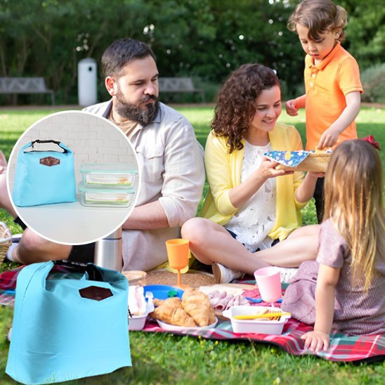 Couple et enfants pique-nique dehors grâce au sac isotherme repas
