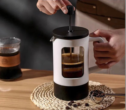 cafetière à piston noire et blanche