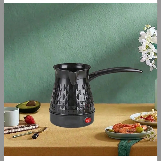 cafetiere camping car noire sur réchaud électrique