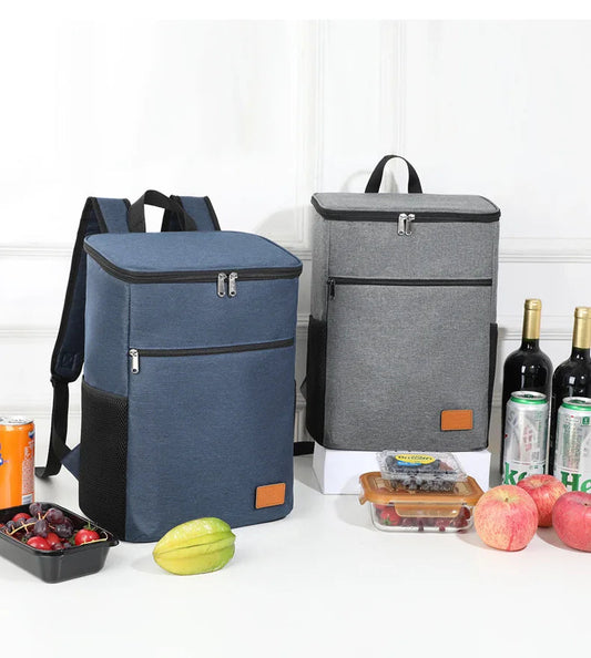 glaciere sac a dos en bleu ou gris sur table