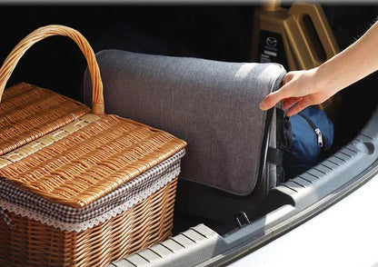 glaciere souple pliée dans coffre voiture