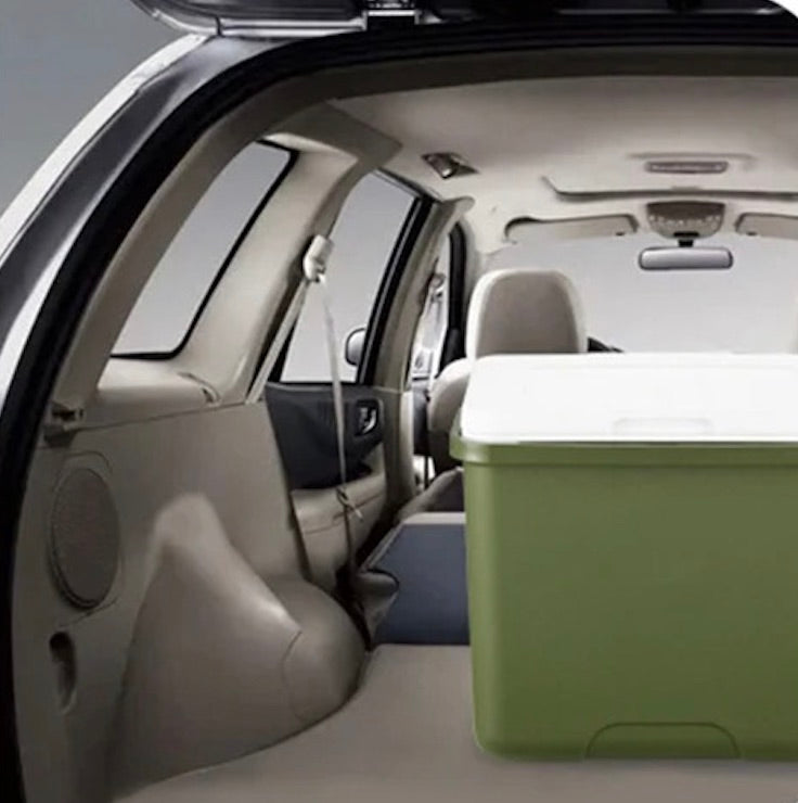 glacière vert militaire dans coffre voiture