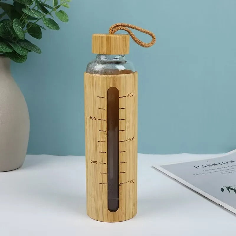 gourde en verre housse bambou graduée