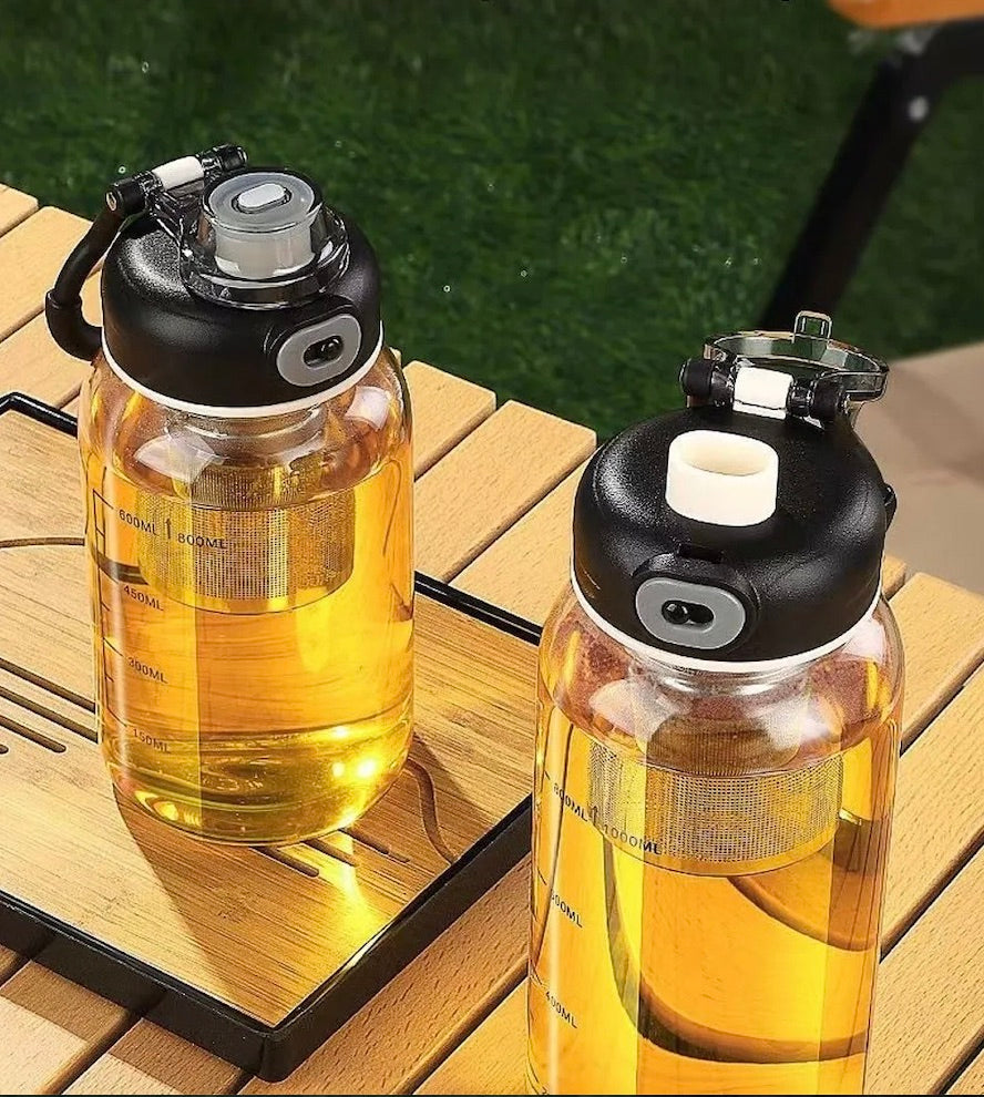 gourde en verre petit moyen format table camping