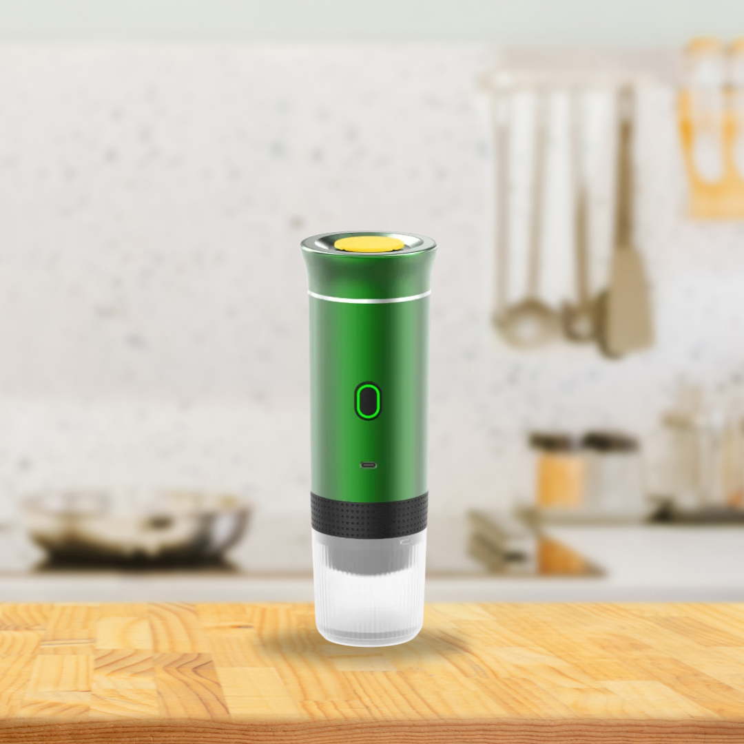 machine a cafe portable verte avec pied sert aussi tasse