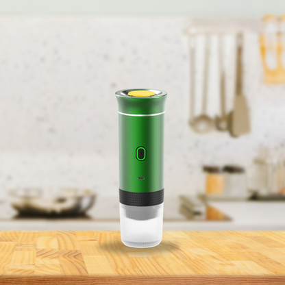 machine a cafe portable verte avec pied sert aussi tasse