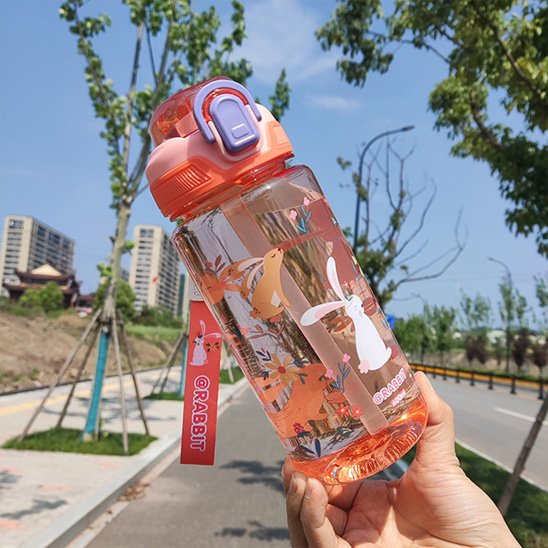 Main tient gourde enfant orange avec corde assortie