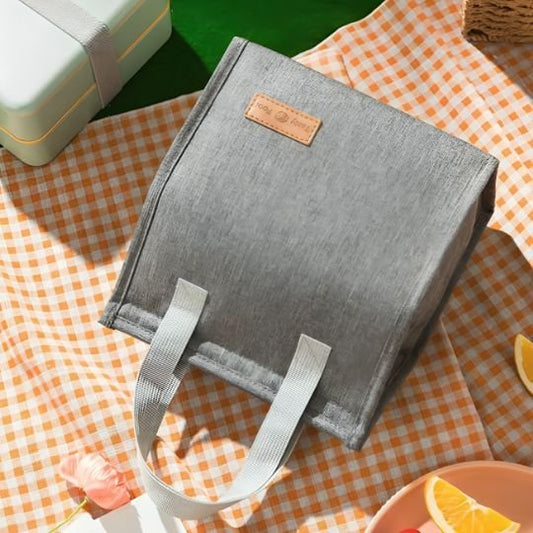 sac isotherme repas femme gris sur nappe