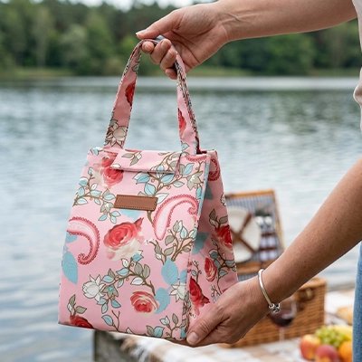 Sac isotherme repas rose avec touches de bleu