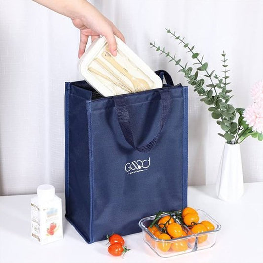 ustensiles glissés dans sac isotherme bleu